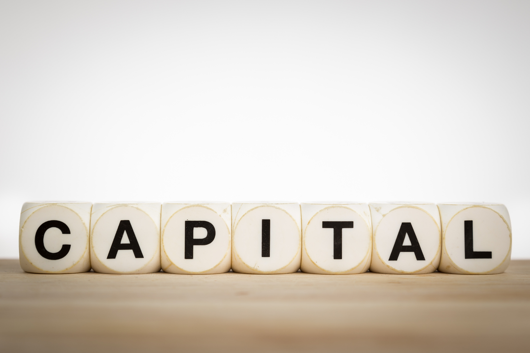 capital-dé